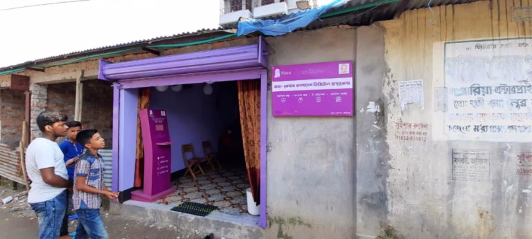 Young boys outside shop in Bangladesh