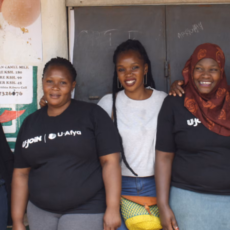Women smiling posing for photo