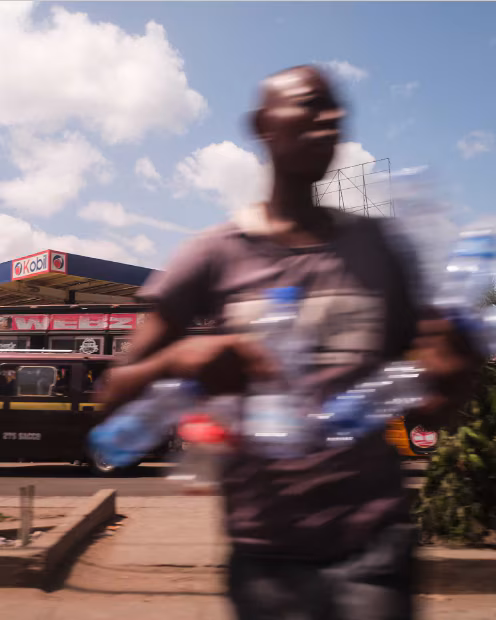 In motion photo of person recycling