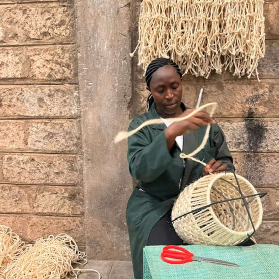 Woman weaving basket